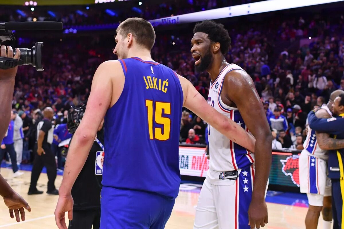 Jan 28, 2023; Philadelphia, Pennsylvania, USA; Denver Nuggets center Nikola Jokic (15) and Philadelphia 76ers center Joel Embiid (21) meet after a game at Wells Fargo Center. Mandatory Credit: Kyle Ross-USA TODAY Sports
