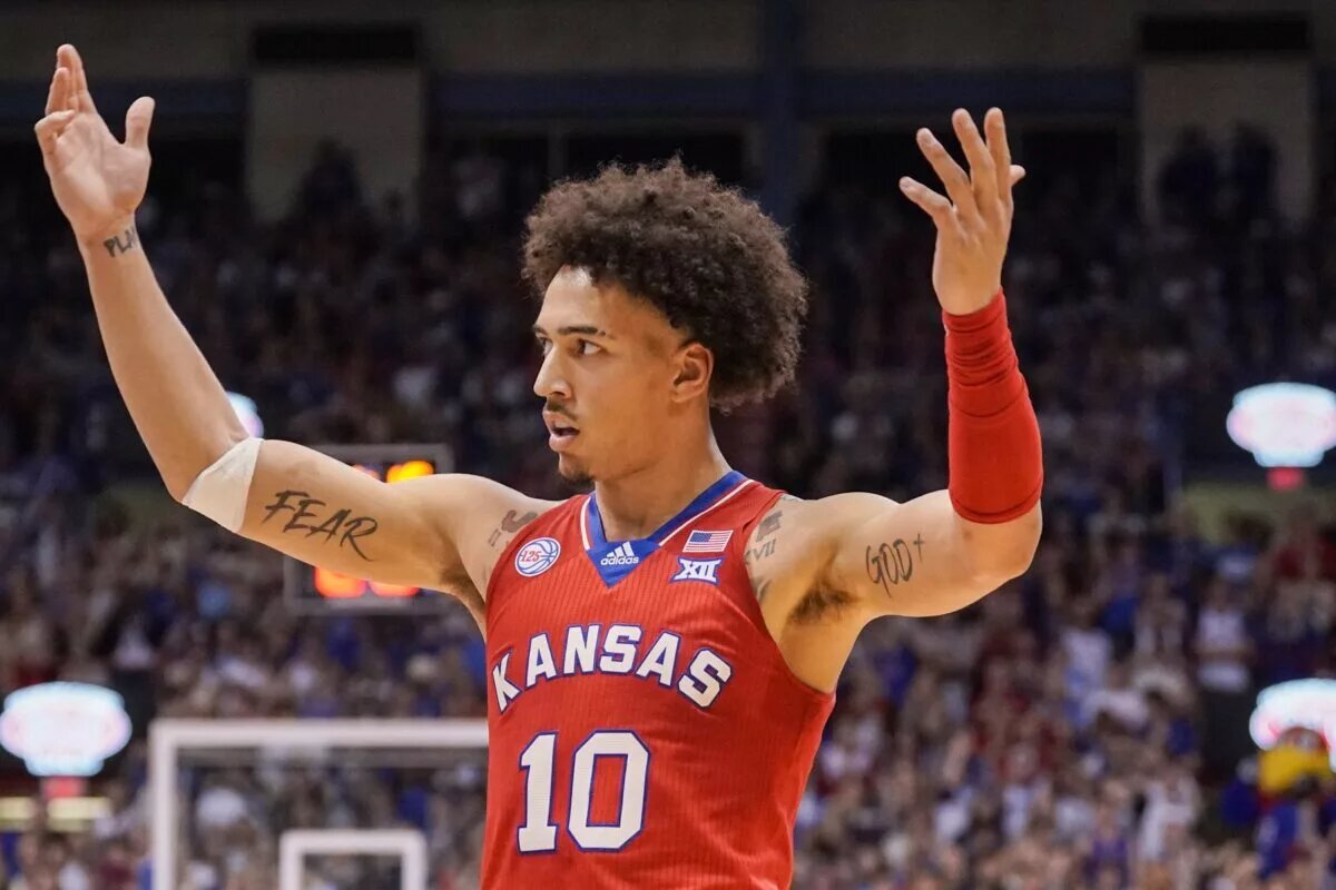Feb 28, 2023; Lawrence, Kansas, USA; Kansas Jayhawks forward Jalen Wilson (10) celebrates toward fans against the Texas Tech Red Raiders during the first half at Allen Fieldhouse. Mandatory Credit: Denny Medley-USA TODAY Sports