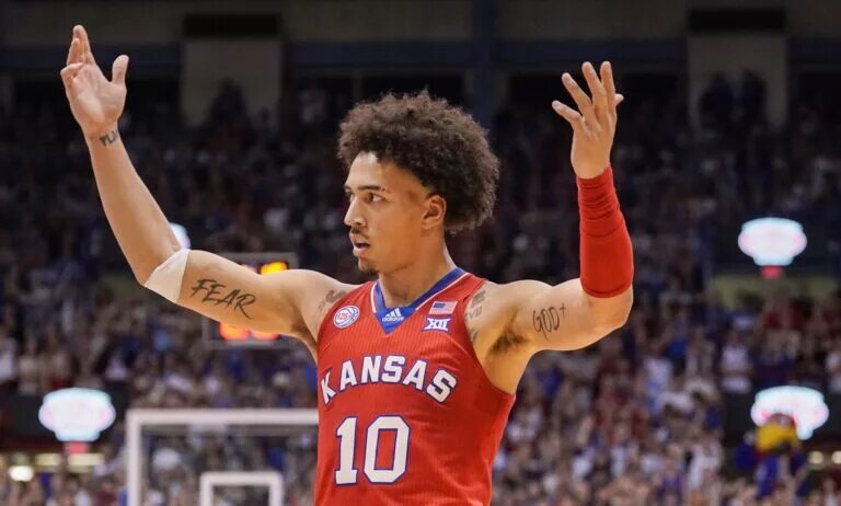 Feb 28, 2023; Lawrence, Kansas, USA; Kansas Jayhawks forward Jalen Wilson (10) celebrates toward fans against the Texas Tech Red Raiders during the first half at Allen Fieldhouse. Mandatory Credit: Denny Medley-USA TODAY Sports
