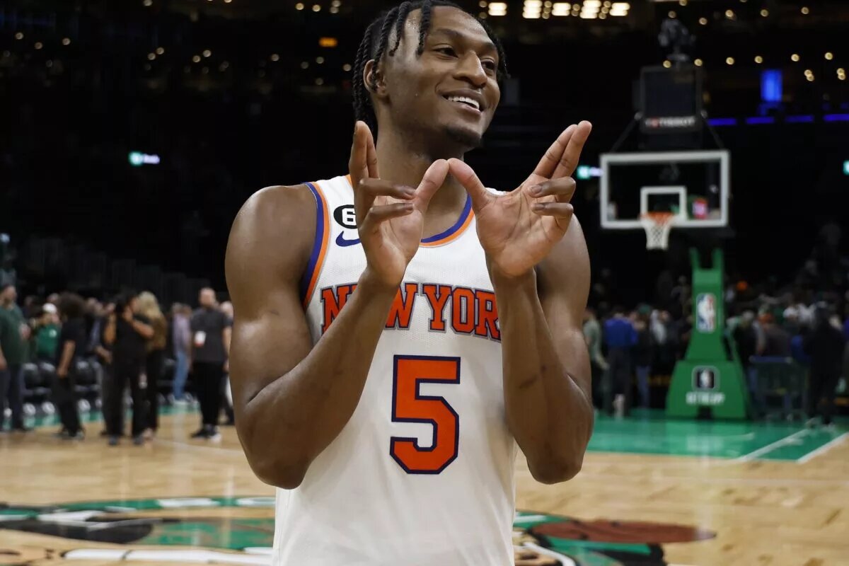 Mar 5, 2023; Boston, Massachusetts, USA; New York Knicks guard Immanuel Quickley (5) smiles as he leaves the court after their double overtime win over the Boston Celtics at TD Garden. Mandatory Credit: Winslow Townson-USA TODAY Sports