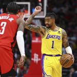 Mar 15, 2023; Houston, Texas, USA; Los Angeles Lakers guard D'Angelo Russell (1) brings the ball up the court as Houston Rockets guard Kevin Porter Jr. (3) defends during the third quarter at Toyota Center. Mandatory Credit: Troy Taormina-USA TODAY Sports
