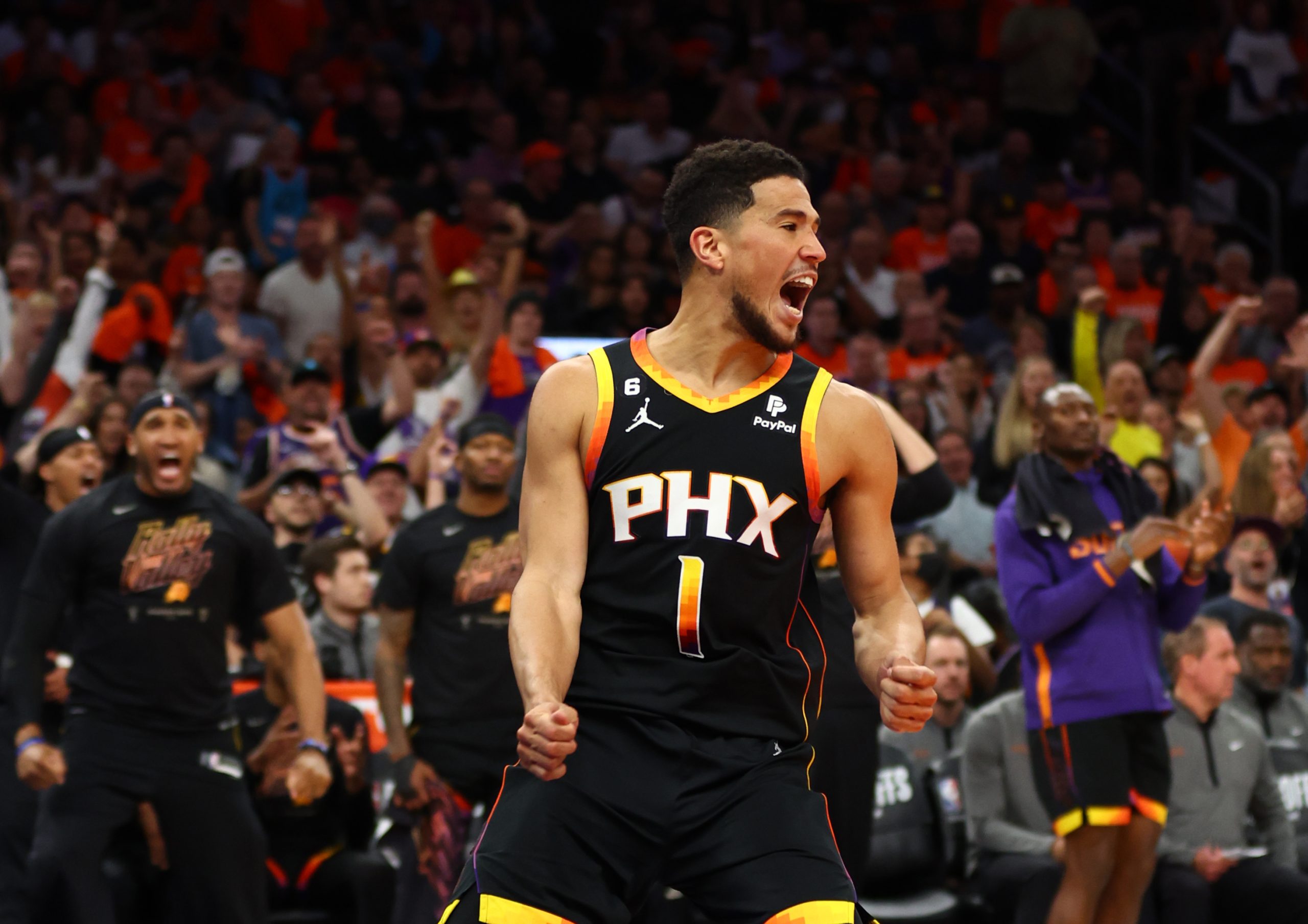 Apr 25, 2023; Phoenix, Arizona, USA; Phoenix Suns guard Devin Booker (1) celebrates after slam dunking the ball against the Los Angeles Clippers during the second half in game five of the 2023 NBA playoffs at Footprint Center. Mandatory Credit: Mark J. Rebilas-USA TODAY Sports