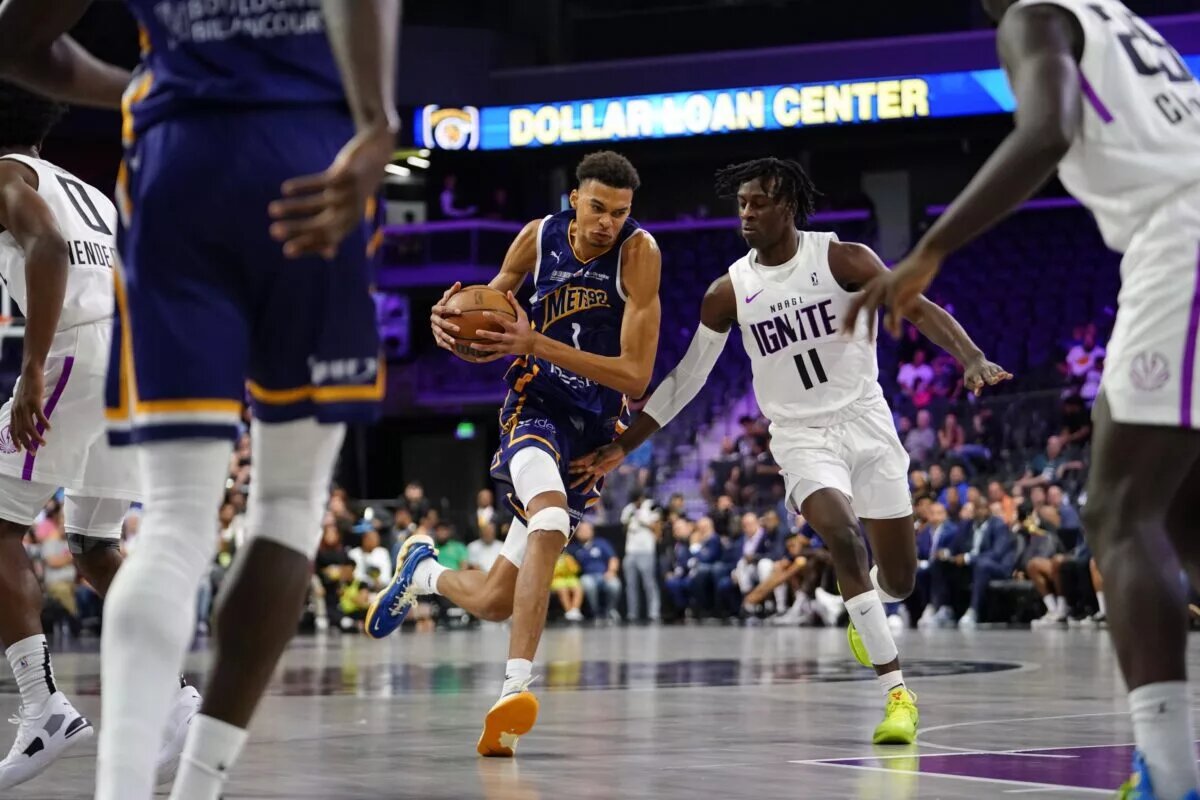 Oct 4, 2022; Henderson, NV, USA; Boulogne-Levallois Metropolitans 92 forward Victor Wembanyama (1) drives the ball against NBA G League Ignite forward Leonard Miller (11) during the third quarter at The Dollar Loan Center. Mandatory Credit: Lucas Peltier-USA TODAY Sports