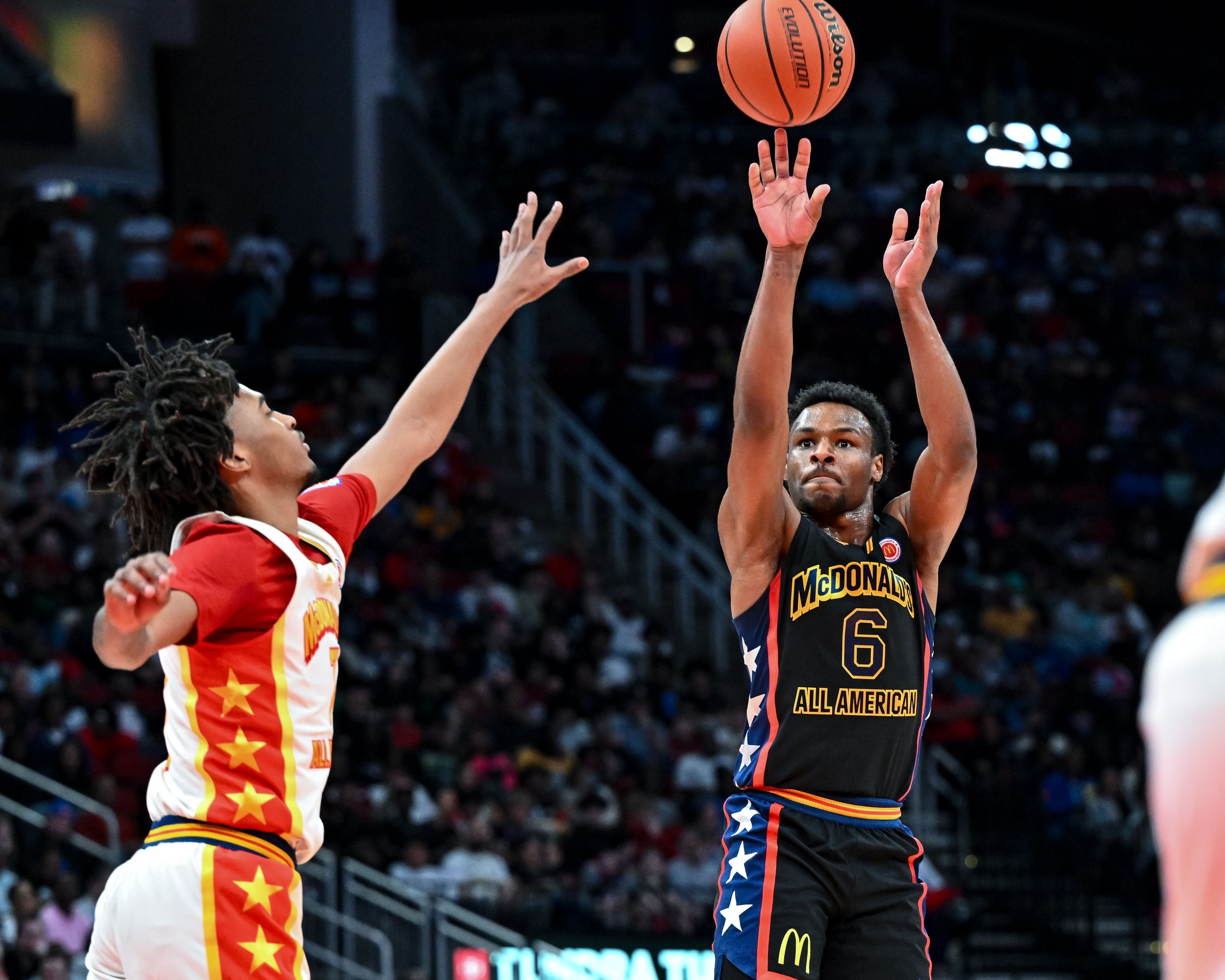 Mar 28, 2023; Houston, TX, USA; McDonald's All American West guard Bronny James (6) shoots the ball during the first half against the McDonald's All American East at Toyota Center. Mandatory Credit: Maria Lysaker-USA TODAY Sports