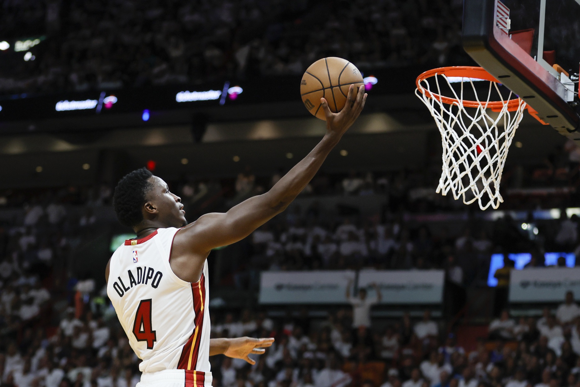 Apr 22, 2023; Miami, Florida, USA; Miami Heat guard Victor Oladipo (4) drives to the basket in the fourth quarter against the Milwaukee Bucks during game three of the 2023 NBA Playoffs at Kaseya Center. Mandatory Credit: Sam Navarro-USA TODAY Sports