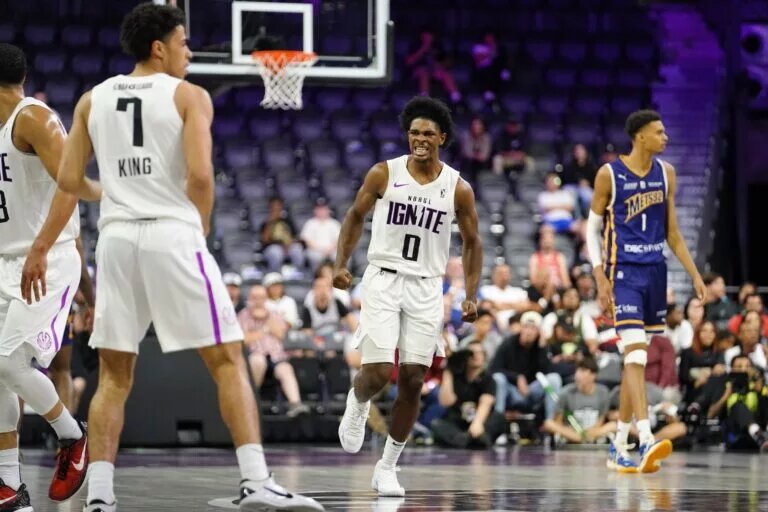 Oct 4, 2022; Henderson, NV, USA; NBA G League Ignite guard Scoot Henderson (0) reacts to a three-point score by guard Mojave King (7) against the Boulogne-Levallois Metropolitans 92 during the third quarter at The Dollar Loan Center. Mandatory Credit: Lucas Peltier-USA TODAY Sports