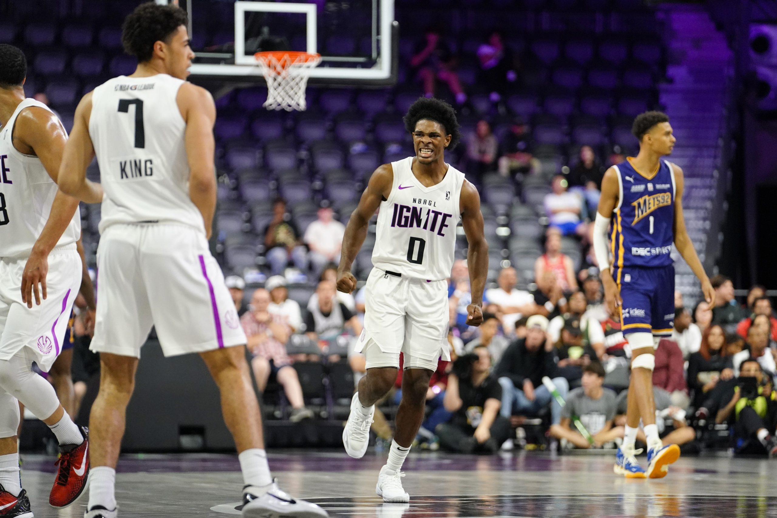 Oct 4, 2022; Henderson, NV, USA; NBA G League Ignite guard Scoot Henderson (0) reacts to a three-point score by guard Mojave King (7) against the Boulogne-Levallois Metropolitans 92 during the third quarter at The Dollar Loan Center. Mandatory Credit: Lucas Peltier-USA TODAY Sports
