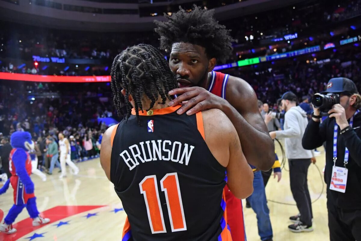 Feb 10, 2023; Philadelphia, Pennsylvania, USA; Philadelphia 76ers center Joel Embiid (21) with New York Knicks guard Jalen Brunson (11) after win against the Knicks at Wells Fargo Center. Mandatory Credit: Eric Hartline-USA TODAY Sports