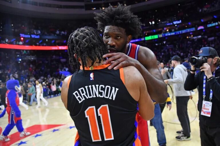 Feb 10, 2023; Philadelphia, Pennsylvania, USA; Philadelphia 76ers center Joel Embiid (21) with New York Knicks guard Jalen Brunson (11) after win against the Knicks at Wells Fargo Center. Mandatory Credit: Eric Hartline-USA TODAY Sports