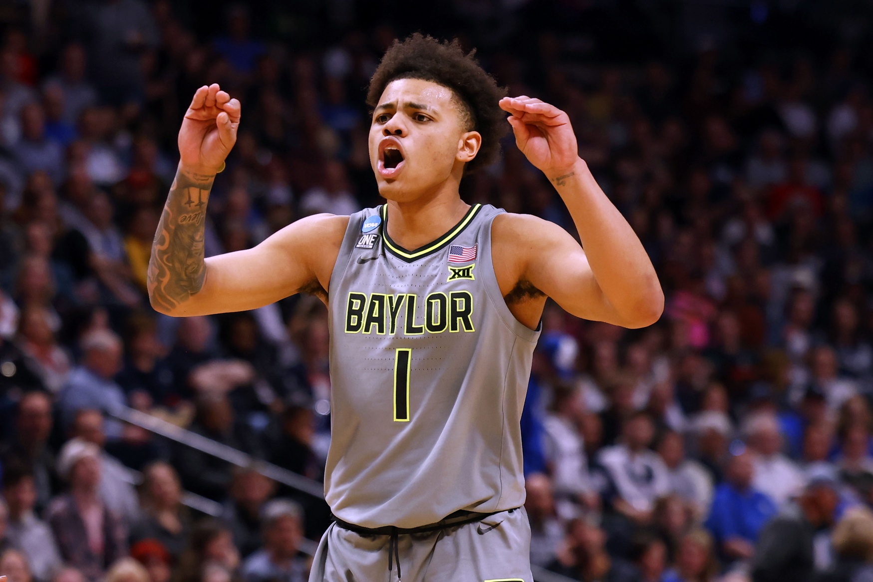 Mar 19, 2023; Denver, CO, USA; Baylor Bears guard Keyonte George (1) reacts in the second half against the Creighton Bluejays at Ball Arena. Will the Utah Jazz sraft him in the first round?Mandatory Credit: Michael Ciaglo-USA TODAY Sports