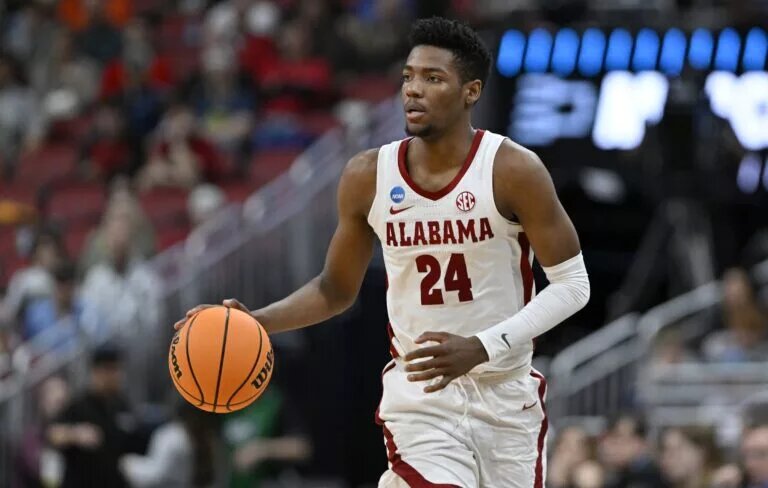 Mar 24, 2023; Louisville, KY, USA; Alabama Crimson Tide forward Brandon Miller (24) dribbles during the second half of the NCAA tournament round of sixteen against the San Diego State Aztecs at KFC YUM! Center. Will the Charlotte Hornets take Miler with the second overall pick?Mandatory Credit: Jamie Rhodes-USA TODAY Sports