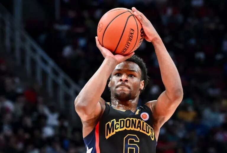 Mar 28, 2023; Houston, TX, USA; McDonald's All American West guard Bronny James (6) shoots the ball during the first half against the McDonald's All American East at Toyota Center. Mandatory Credit: Maria Lysaker-USA TODAY Sports