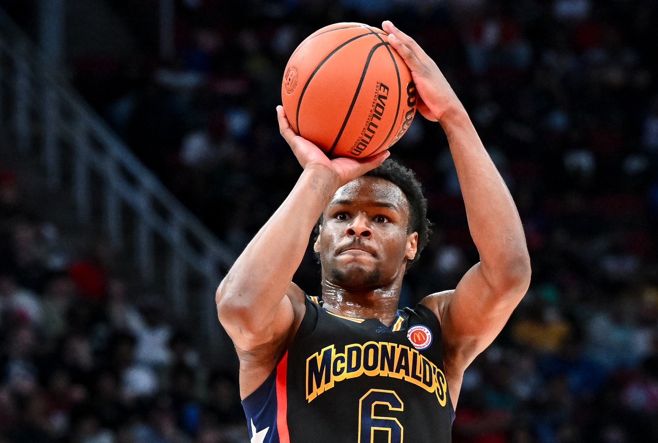 Mar 28, 2023; Houston, TX, USA; McDonald's All American West guard Bronny James (6) shoots the ball during the first half against the McDonald's All American East at Toyota Center. Mandatory Credit: Maria Lysaker-USA TODAY Sports