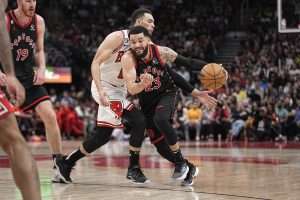 Apr 12, 2023; Toronto, Ontario, CAN; Toronto Raptors guard Fred VanVleet (23) drives to the basket against Chicago Bulls guard Zach LaVine (8) during the second half of a NBA Play-In game at Scotiabank Arena. Mandatory Credit: John E. Sokolowski-USA TODAY Sports