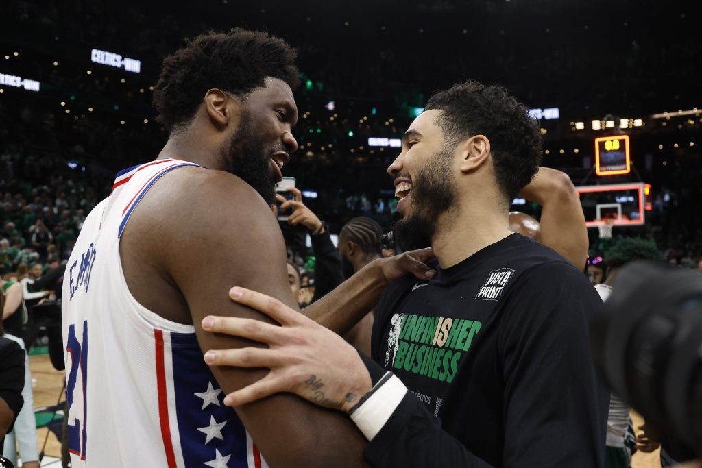 May 14, 2023; Boston, Massachusetts, USA; Boston Celtics forward Jayson Tatum (0) (right) shares a laugh with Philadelphia 76ers center Joel Embiid (21) after game seven of the 2023 NBA playoffs at TD Garden. Mandatory Credit: Winslow Townson-USA TODAY Sports