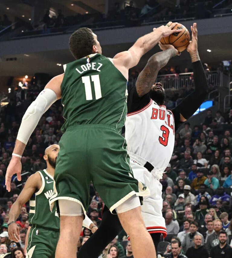 Brook Lopez blocks an Andre Drummond shot attempt