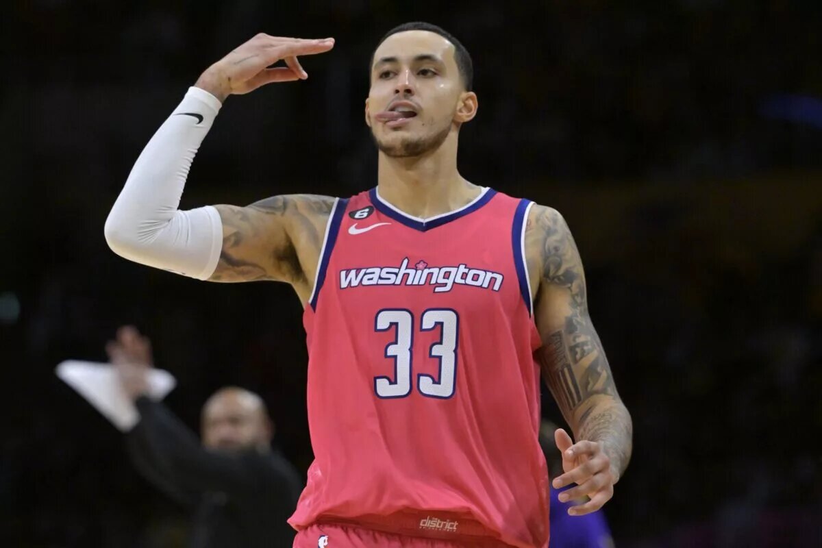 Dec 18, 2022; Los Angeles, California, USA; Washington Wizards forward Kyle Kuzma (33) signals after a 3 point basket in the second half against the Los Angeles Lakers at Crypto.com Arena. Mandatory Credit: Jayne Kamin-Oncea-USA TODAY Sports
