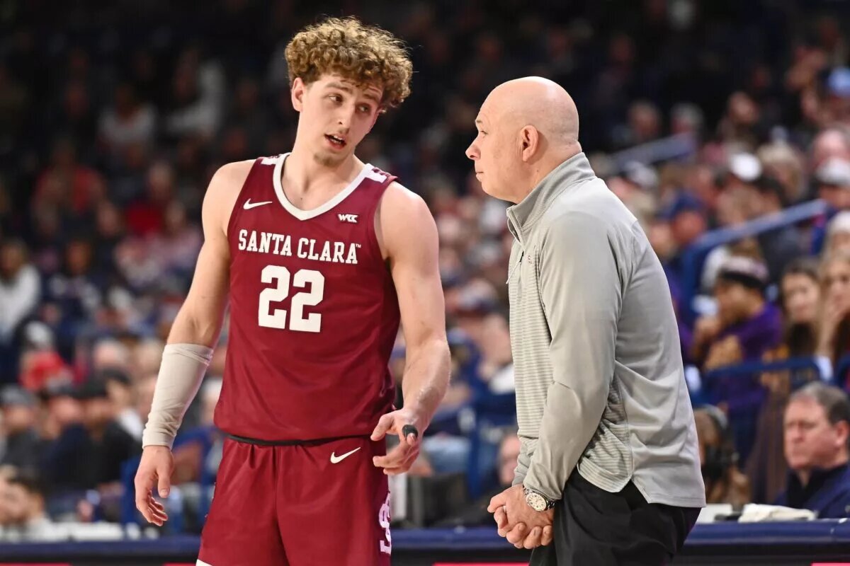 Feb 2, 2023; Spokane, Washington, USA; Santa Clara Broncos guard Brandin Podziemski (22) talks with Santa Clara Broncos head coach Herb Sendek during a game against the Gonzaga Bulldogs in the second half at McCarthey Athletic Center. Gonzaga won 88-70. Mandatory Credit: James Snook-USA TODAY Sports