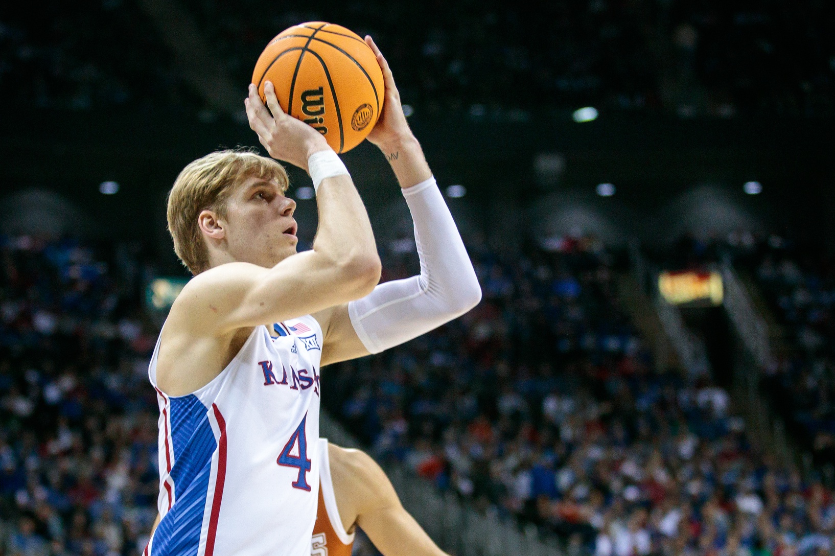 Mar 11, 2023; Kansas City, MO, USA; Kansas Jayhawks guard Gradey Dick (4) shoots the ball during the first half against the Texas Longhorns at T-Mobile Center. Mandatory Credit: William Purnell-USA TODAY Sports