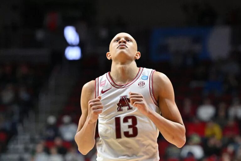 Mar 16, 2023; Des Moines, IA, USA; Arkansas Razorbacks guard Jordan Walsh (13) reacts after a play against the Illinois Fighting Illini during the first half at Wells Fargo Arena. Mandatory Credit: Jeffrey Becker-USA TODAY Sports