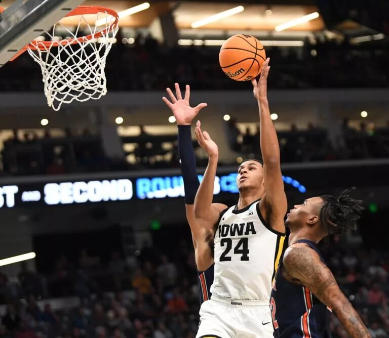Mar 16, 2023; Birmingham, AL, USA; Iowa forward Kris Murray (24) scores in the lane against Auburn during the NCAA regional. at Legacy Arena. Mandatory Credit: Gary Cosby Jr.-Tuscaloosa News Ncaa Basketball Ncaa Regional Auburn Vs Iowa
