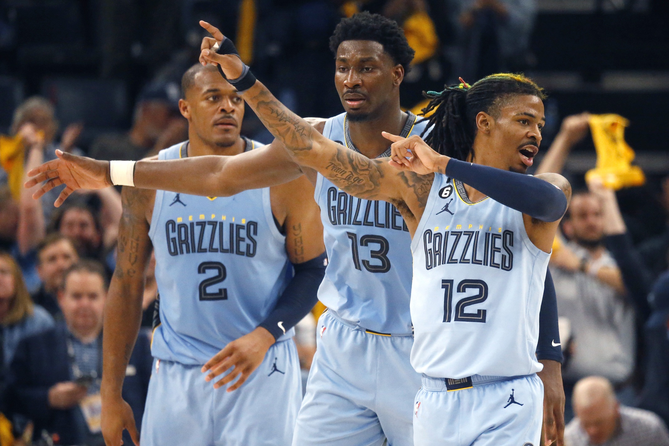 Apr 26, 2023; Memphis, Tennessee, USA; Memphis Grizzlies forward Jaren Jackson Jr. (13) and Memphis Grizzlies guard Ja Morant (12) react during the second half against the Los Angeles Lakers during game five of the 2023 NBA playoffs at FedExForum. Mandatory Credit: Petre Thomas-USA TODAY Sports