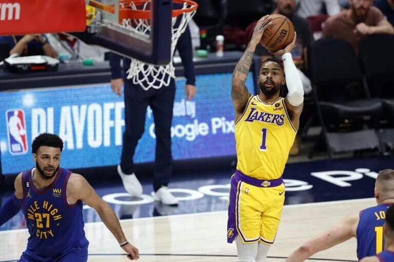 May 16, 2023; Denver, Colorado, USA; Los Angeles Lakers guard D'Angelo Russell (1) shoots against the Denver Nuggets in the third quarter during game one of the Western Conference Finals for the 2023 NBA playoffs at Ball Arena. Mandatory Credit: Isaiah J. Downing-USA TODAY Sports