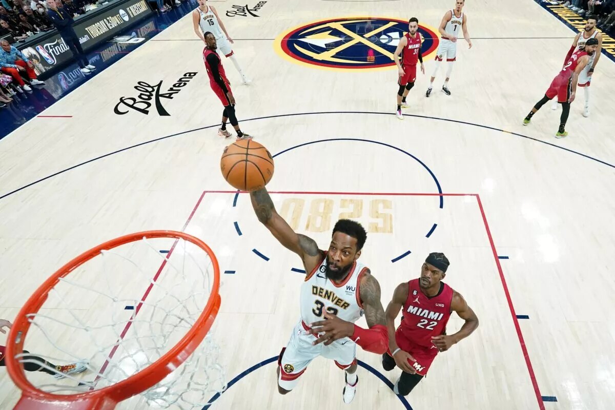 Jun 12, 2023; Denver, Colorado, USA; Denver Nuggets forward Jeff Green (32) shoots the ball against Miami Heat forward Jimmy Butler (22) during the first half in game five of the 2023 NBA Finals at Ball Arena. Mandatory Credit: Jack Dempsey/Pool Photo-USA TODAY Sports