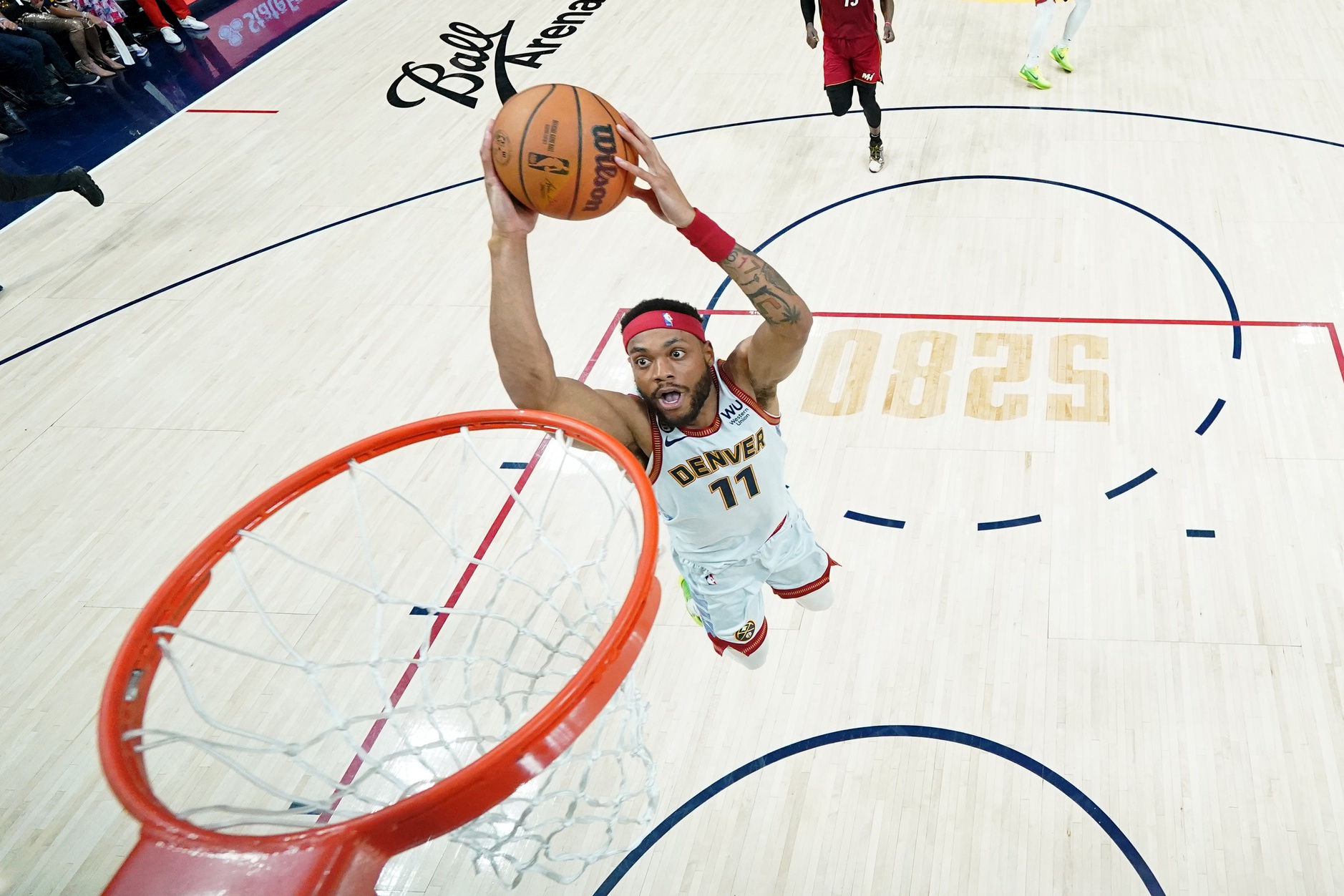 Jun 12, 2023; Denver, Colorado, USA; Denver Nuggets forward Bruce Brown (11) dunks against the Miami Heat during the first half in game five of the 2023 NBA Finals at Ball Arena. Mandatory Credit: Jack Dempsey/Pool Photo-USA TODAY Sports