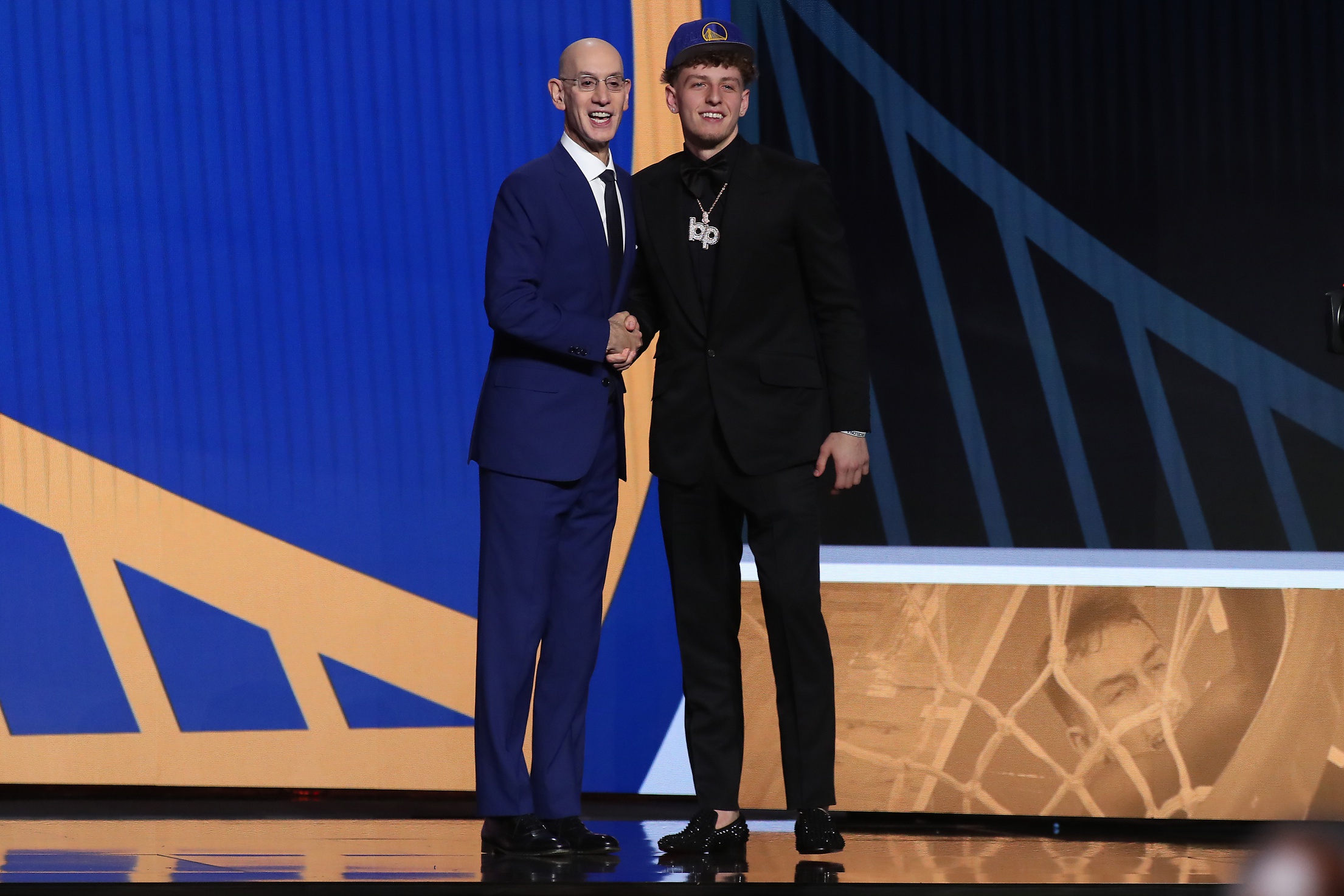 Jun 22, 2023; Brooklyn, NY, USA; Brandin Podziemski (Santa Clara) with NBA commissioner Adam Silver after being selected nineteenth by the Golden State Warriors in the first round of the 2023 NBA Draft at Barclays Arena. Mandatory Credit: Wendell Cruz-USA TODAY Sports
