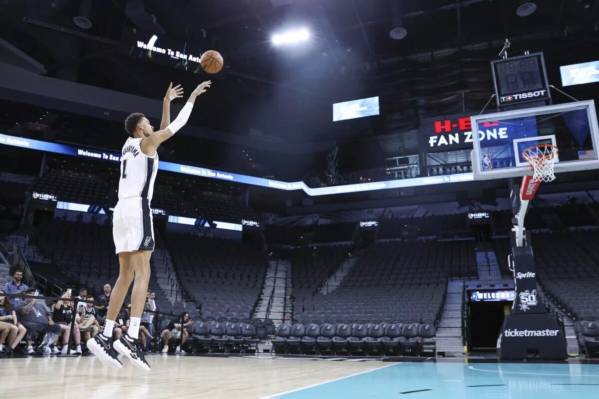 Jun 24, 2023; San Antonio, TX, USA; San Antonio Spurs draft pick Victor Wembanyama shoots around at a press conference at AT&T Center. Mandatory Credit: Troy Taormina-USA TODAY Sports