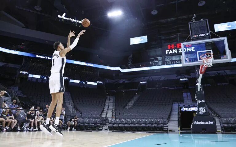 Jun 24, 2023; San Antonio, TX, USA; San Antonio Spurs draft pick Victor Wembanyama shoots around at a press conference at AT&T Center. Mandatory Credit: Troy Taormina-USA TODAY Sports