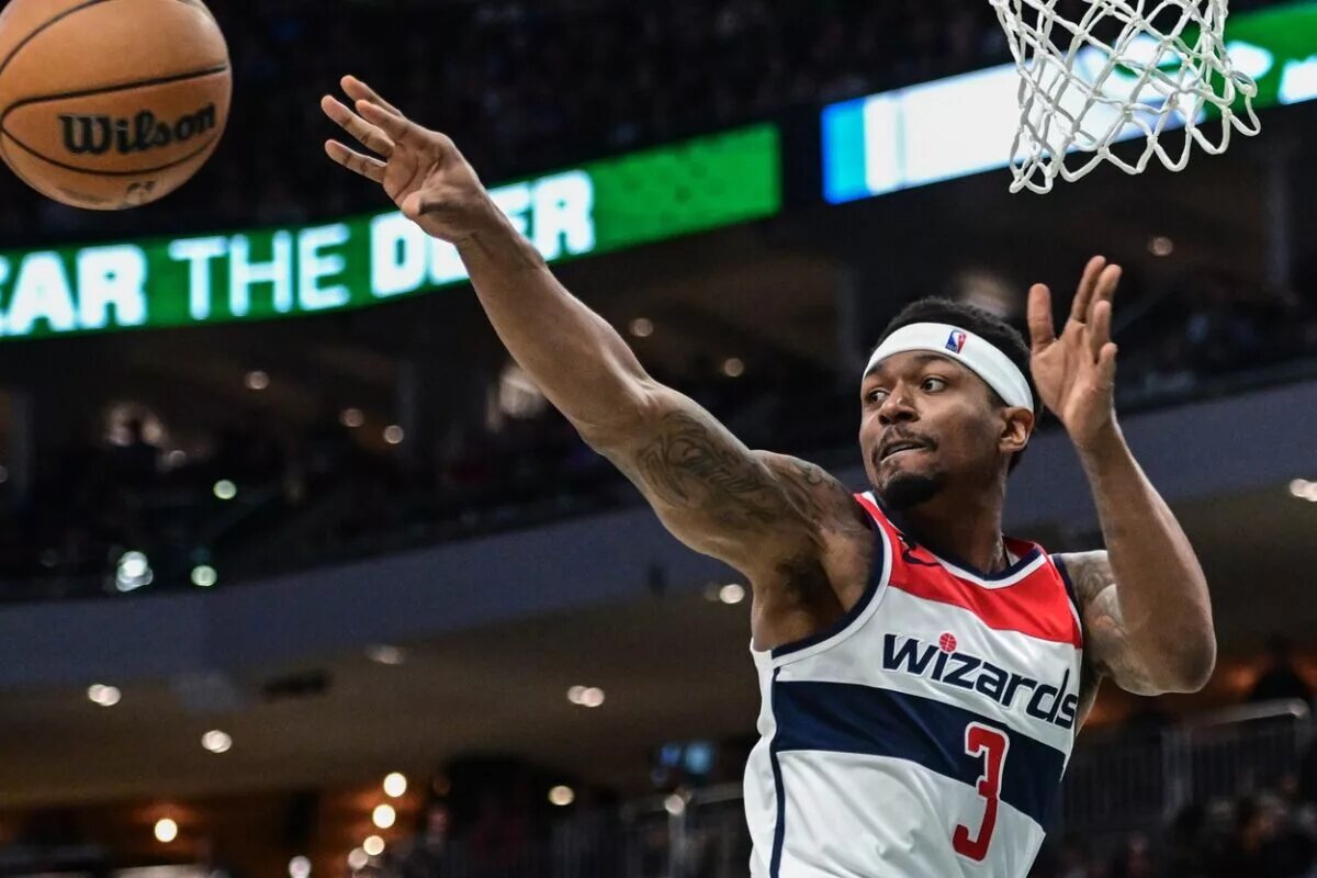 Jan 3, 2023; Milwaukee, Wisconsin, USA; Washington Wizards guard Bradley Beal (3) passes in the second quarter during game against the Milwaukee Bucks at Fiserv Forum. Mandatory Credit: Benny Sieu-USA TODAY Sports