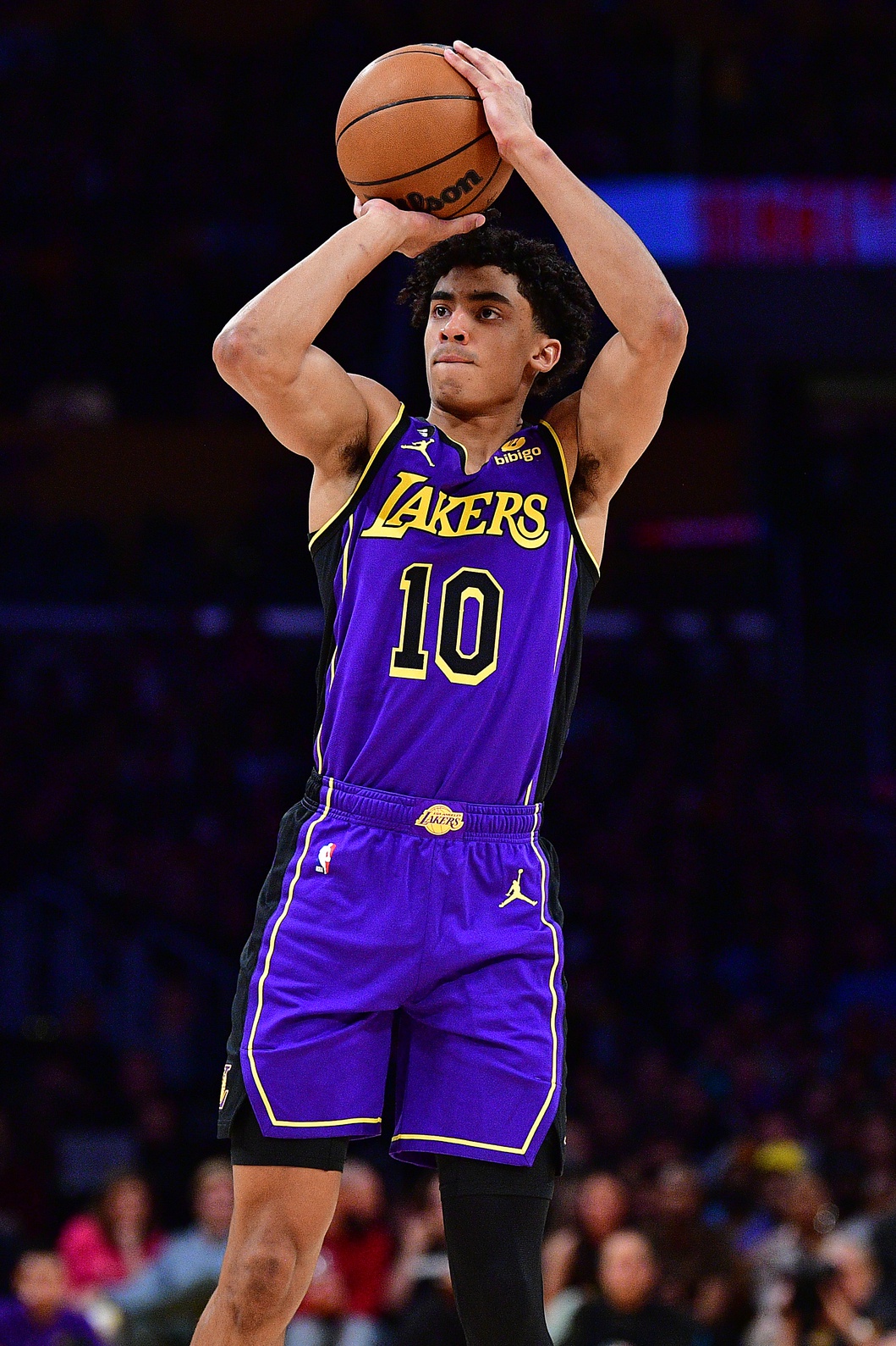 January 20, 2023; Los Angeles, California, USA; Los Angeles Lakers guard Max Christie (10) shoots three point basket against the Memphis Grizzlies during the first half at Crypto.com Arena. Mandatory Credit: Gary A. Vasquez-USA TODAY Sports