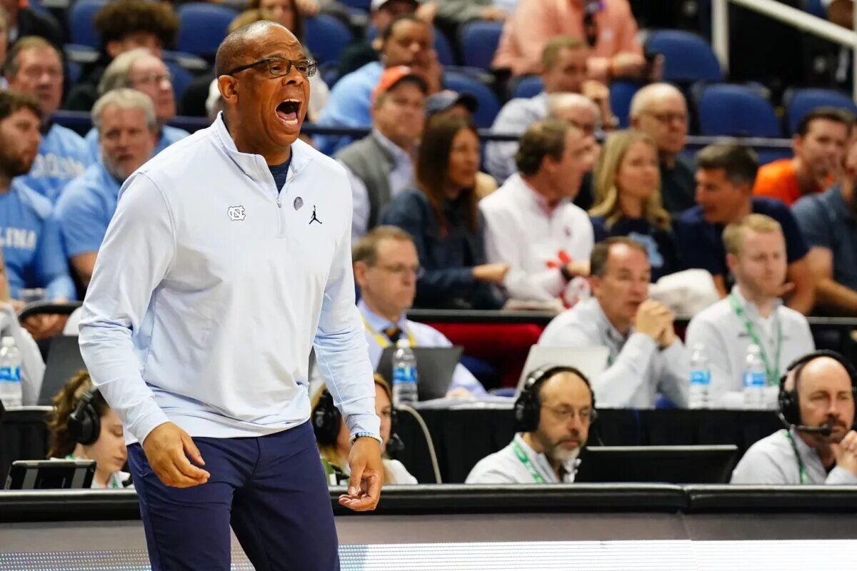 Mar 9, 2023; Greensboro, NC, USA; North Carolina Tar Heels head coach Hubert Davis shouts to his players against the Virginia Cavaliers during the first half of the quarterfinals of the ACC tournament at Greensboro Coliseum. Mandatory Credit: John David Mercer-USA TODAY Sports