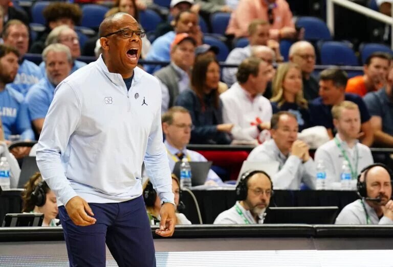 Mar 9, 2023; Greensboro, NC, USA; North Carolina Tar Heels head coach Hubert Davis shouts to his players against the Virginia Cavaliers during the first half of the quarterfinals of the ACC tournament at Greensboro Coliseum. Mandatory Credit: John David Mercer-USA TODAY Sports