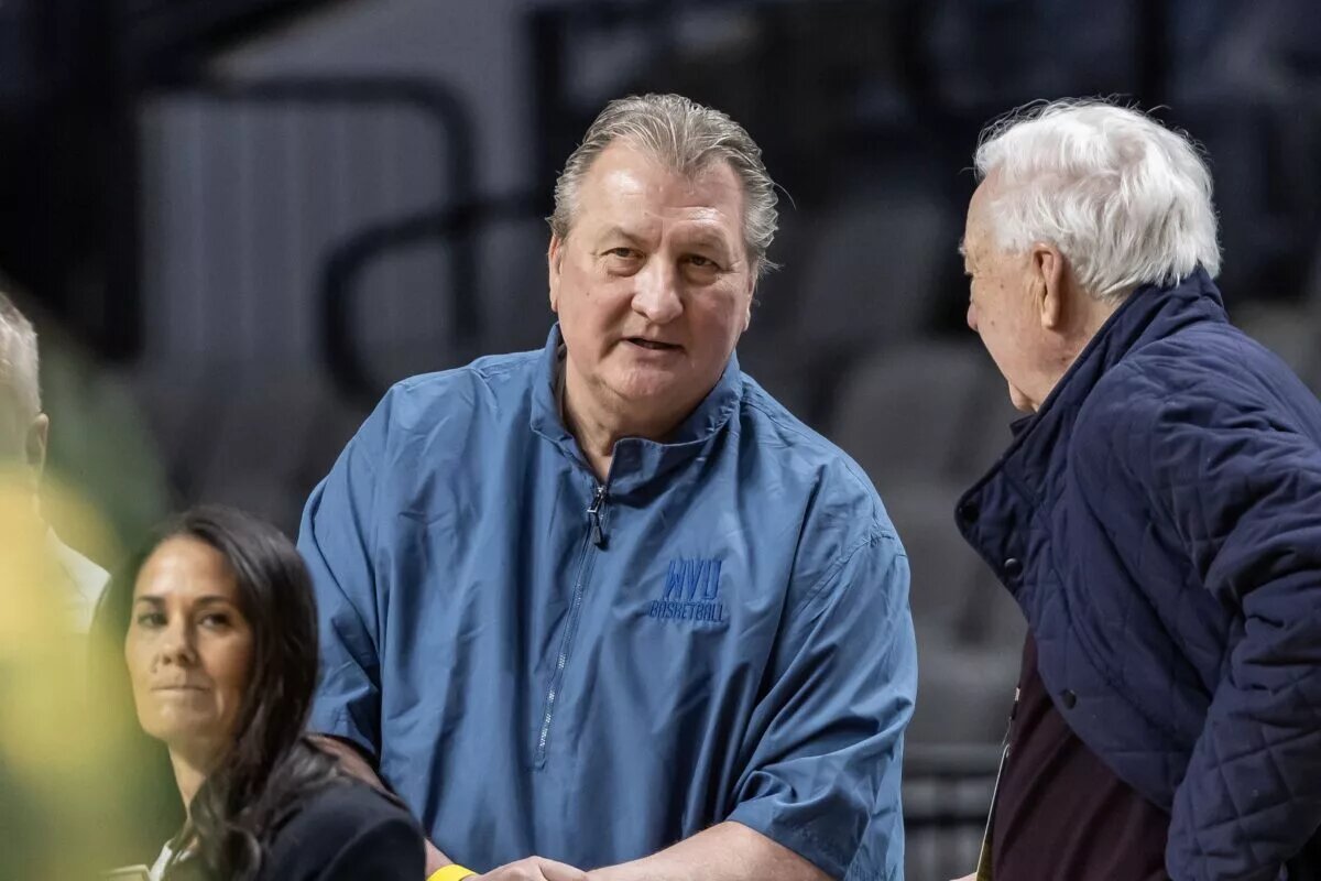 Bob Huggins fights back against West Virginia to get his old position back.