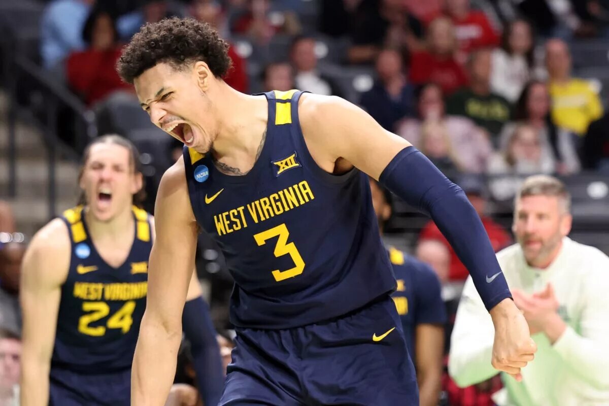 Mar 16, 2023; Birmingham, AL, USA; West Virginia Mountaineers forward Tre Mitchell (3) reacts after scoring a basket while being fouled against the Maryland Terrapins during the second half in the first round of the 2023 NCAA Tournament at Legacy Arena. Mandatory Credit: Vasha Hunt-USA TODAY Sports