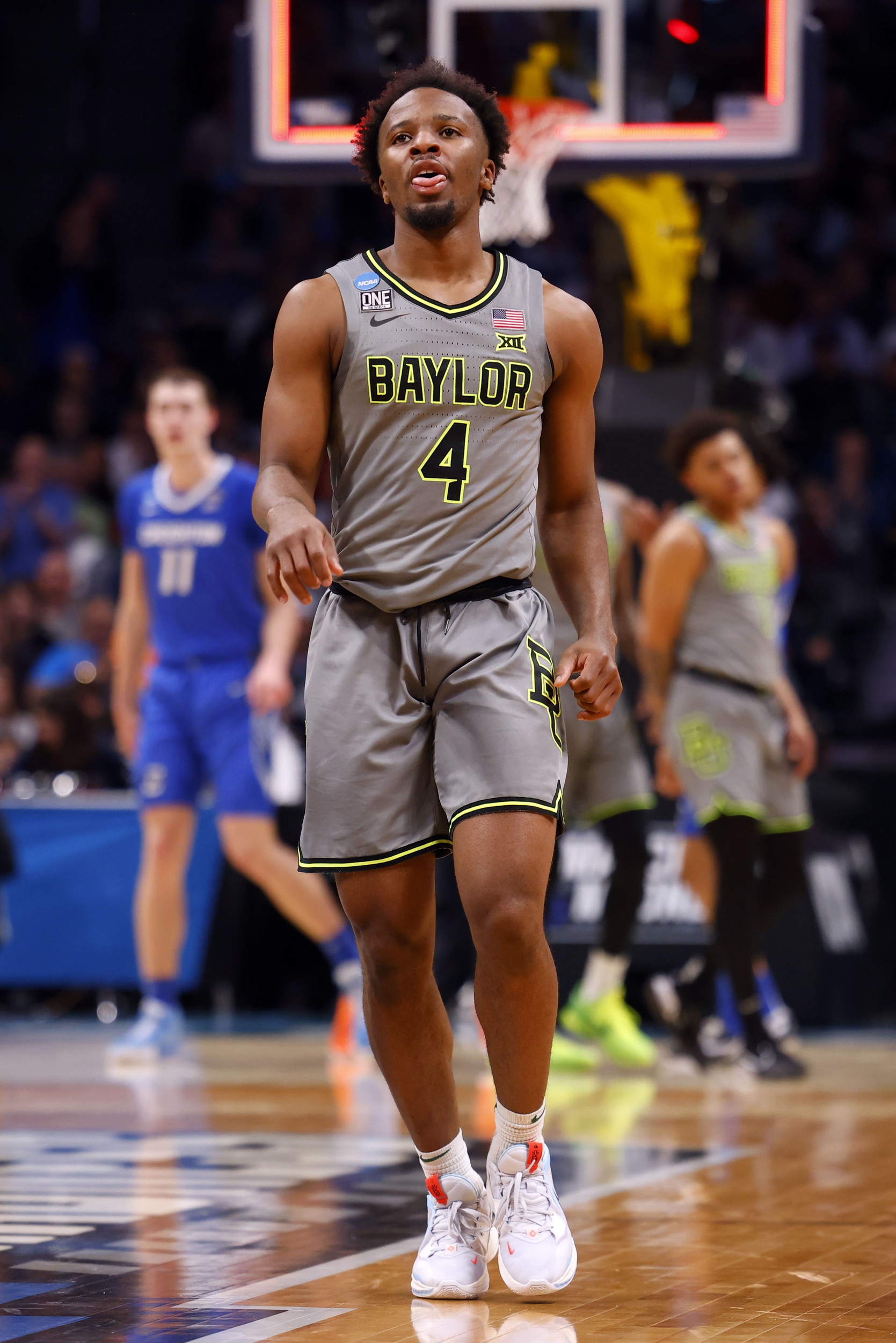 Mar 19, 2023; Denver, CO, USA; Baylor Bears guard LJ Cryer (4) reacts in the first half against the Creighton Bluejays at Ball Arena. Mandatory Credit: Michael Ciaglo-USA TODAY Sports