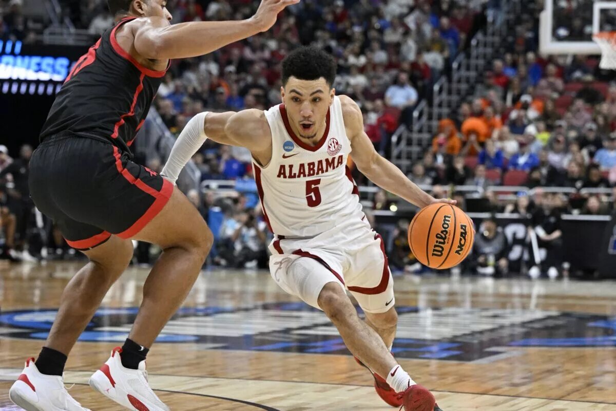 Mar 24, 2023; Louisville, KY, USA; Alabama Crimson Tide guard Jahvon Quinerly (5) drives against San Diego State Aztecs forward Jaedon LeDee (13) during the second half of the NCAA tournament round of sixteen at KFC YUM! Center. Mandatory Credit: Jamie Rhodes-USA TODAY Sports
