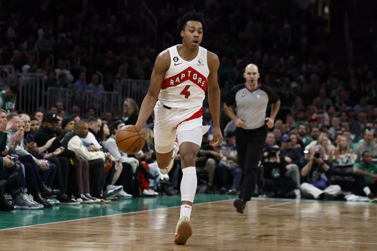 Apr 7, 2023; Boston, Massachusetts, USA; Toronto Raptors forward Scottie Barnes (4) brings the ball up the court against the Boston Celtics during the first quarter at TD Garden. Mandatory Credit: Winslow Townson-USA TODAY Sports