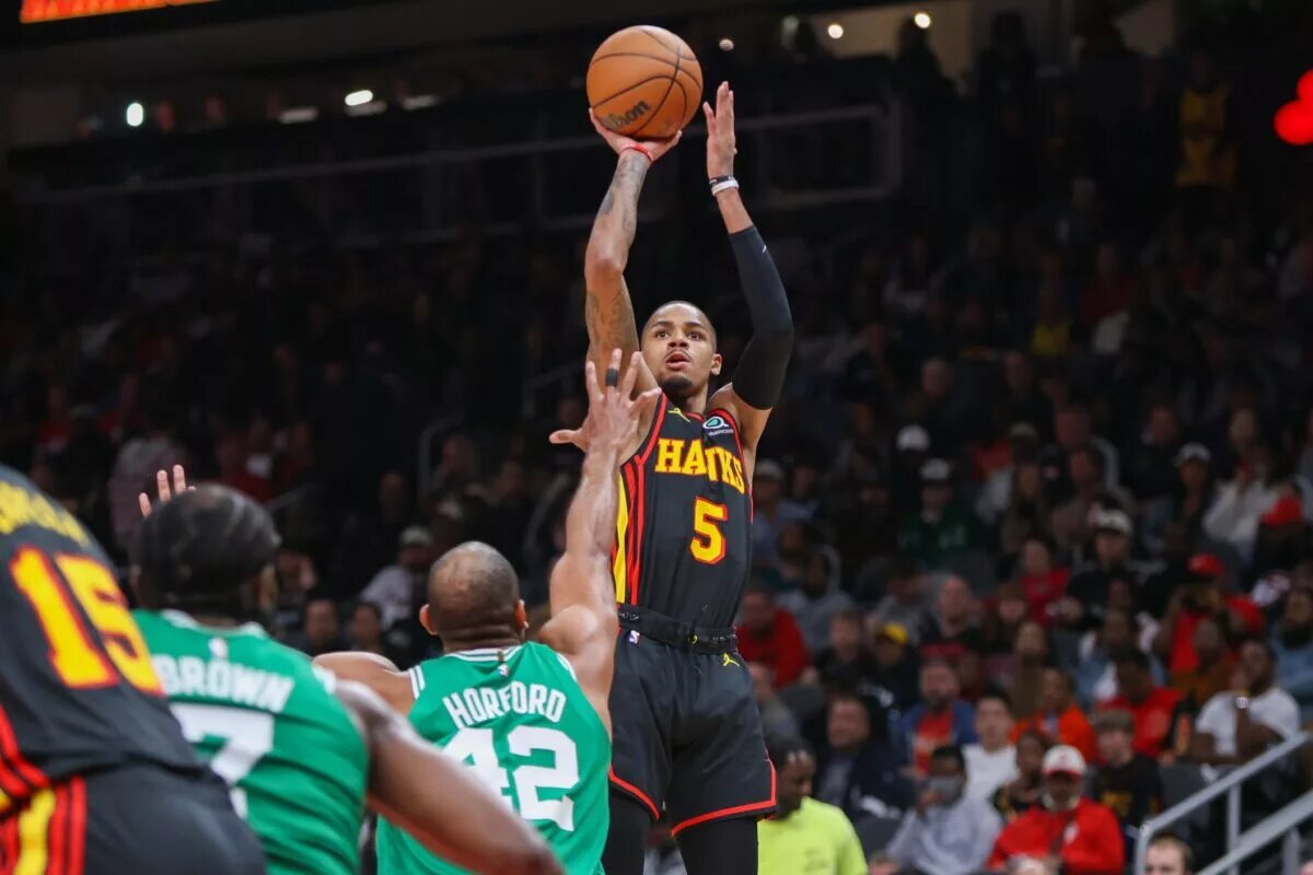 Apr 27, 2023; Atlanta, Georgia, USA; Atlanta Hawks guard Dejounte Murray (5) shoots the ball over Boston Celtics center Al Horford (42) in the second half during game six of the 2023 NBA playoffs at State Farm Arena. Mandatory Credit: Brett Davis-USA TODAY Sports