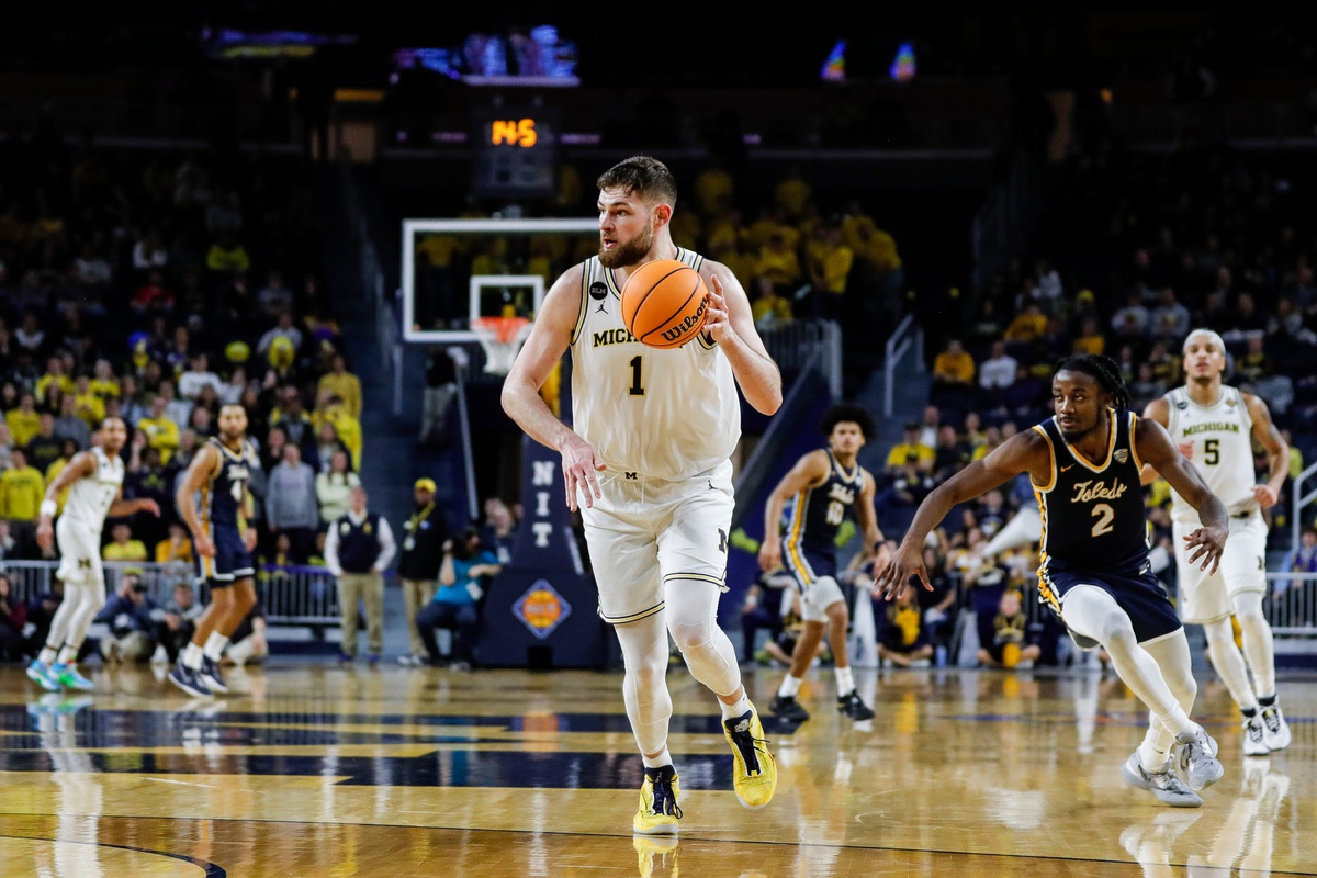 Michigan center Hunter Dickinson (1) dribbles against Toledo as time expires during the second half of the first round of the NIT at Crisler Center in Ann Arbor on Tuesday, March 14, 2023.