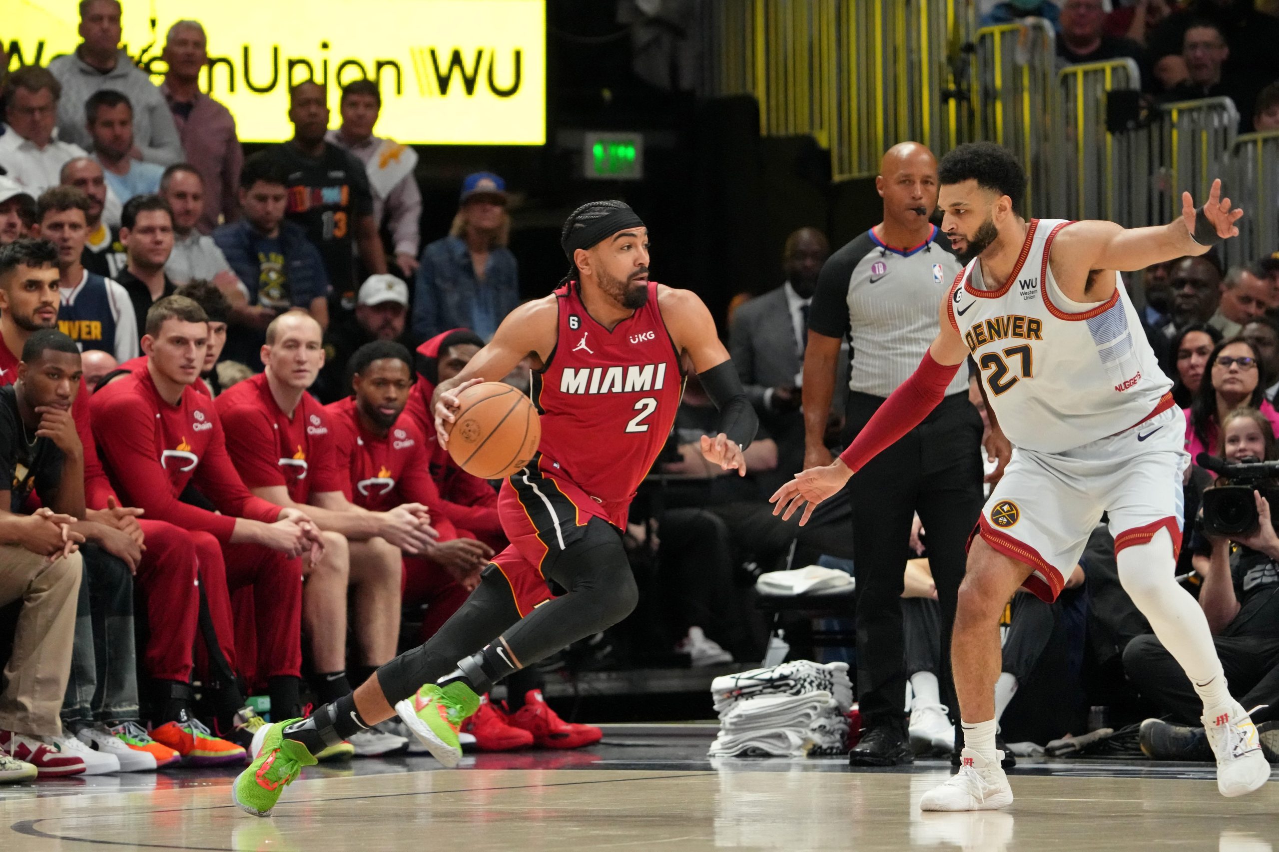 Jun 12, 2023; Denver, Colorado, USA; Miami Heat guard Gabe Vincent (2) dribbles the ball against Denver Nuggets guard Jamal Murray (27) during the first quarter in game five of the 2023 NBA Finals at Ball Arena. Mandatory Credit: Kyle Terada-USA TODAY Sports