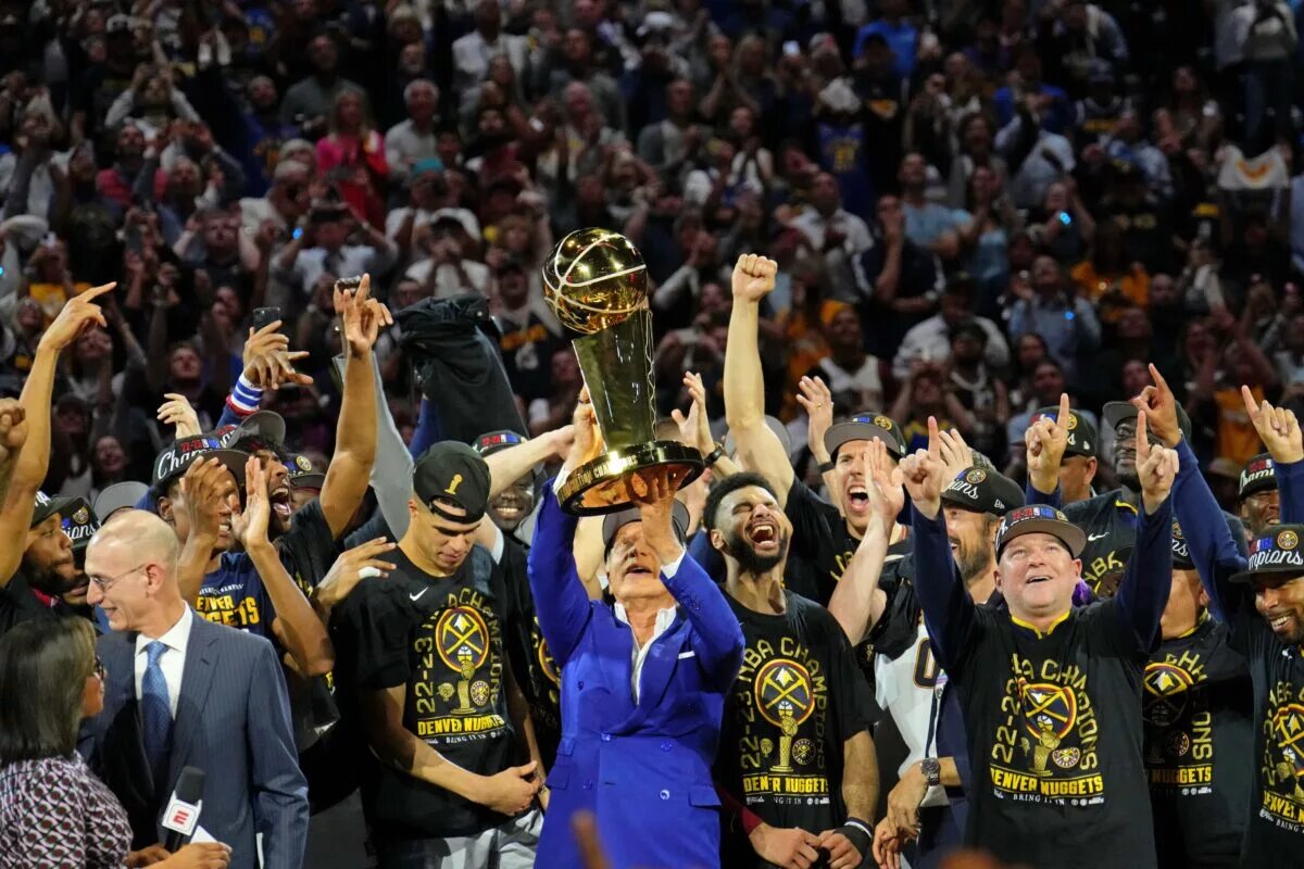 Jun 12, 2023; Denver, Colorado, USA; The Denver Nuggets celebrate after winning the 2023 NBA Finals against the Miami Heat at Ball Arena. Mandatory Credit: Kyle Terada-USA TODAY Sports