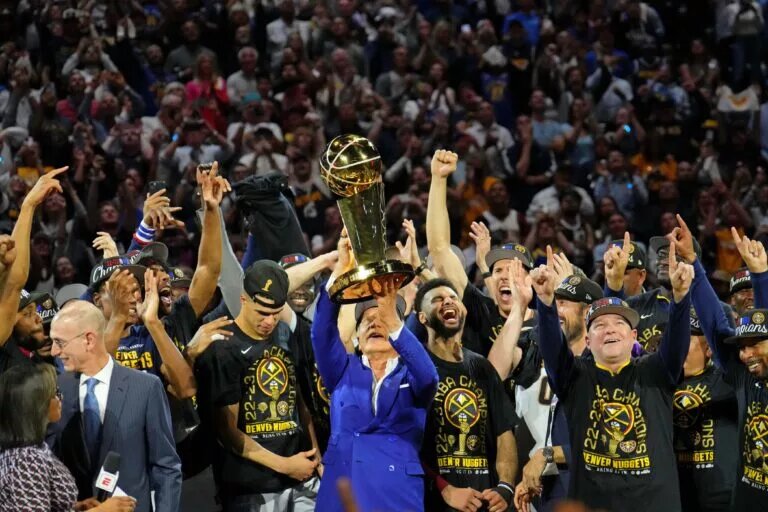 Jun 12, 2023; Denver, Colorado, USA; The Denver Nuggets celebrate after winning the 2023 NBA Finals against the Miami Heat at Ball Arena. Mandatory Credit: Kyle Terada-USA TODAY Sports