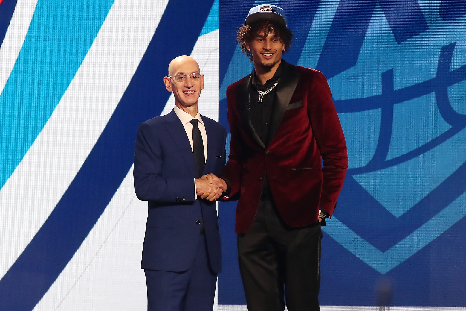 Jun 22, 2023; Brooklyn, NY, USA; Dereck Lively (Kentucky) with NBA commissioner Adam Silver after being selected twelfth by the Oklahoma City Thunder in the first round of the 2023 NBA Draft at Barclays Arena. Mandatory Credit: Wendell Cruz-USA TODAY Sports