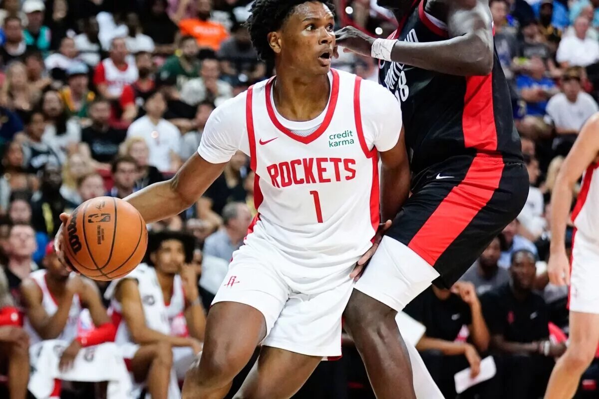 Jul 7, 2023; Las Vegas, NV, USA; Houston Rockets guard Amen Thompson (1) drives the ball against Portland Trail Blazers center Duop Reath (68) during the second half at Thomas & Mack Center. Mandatory Credit: Lucas Peltier-USA TODAY Sports. Thompson looks to help Houston take a big step this season