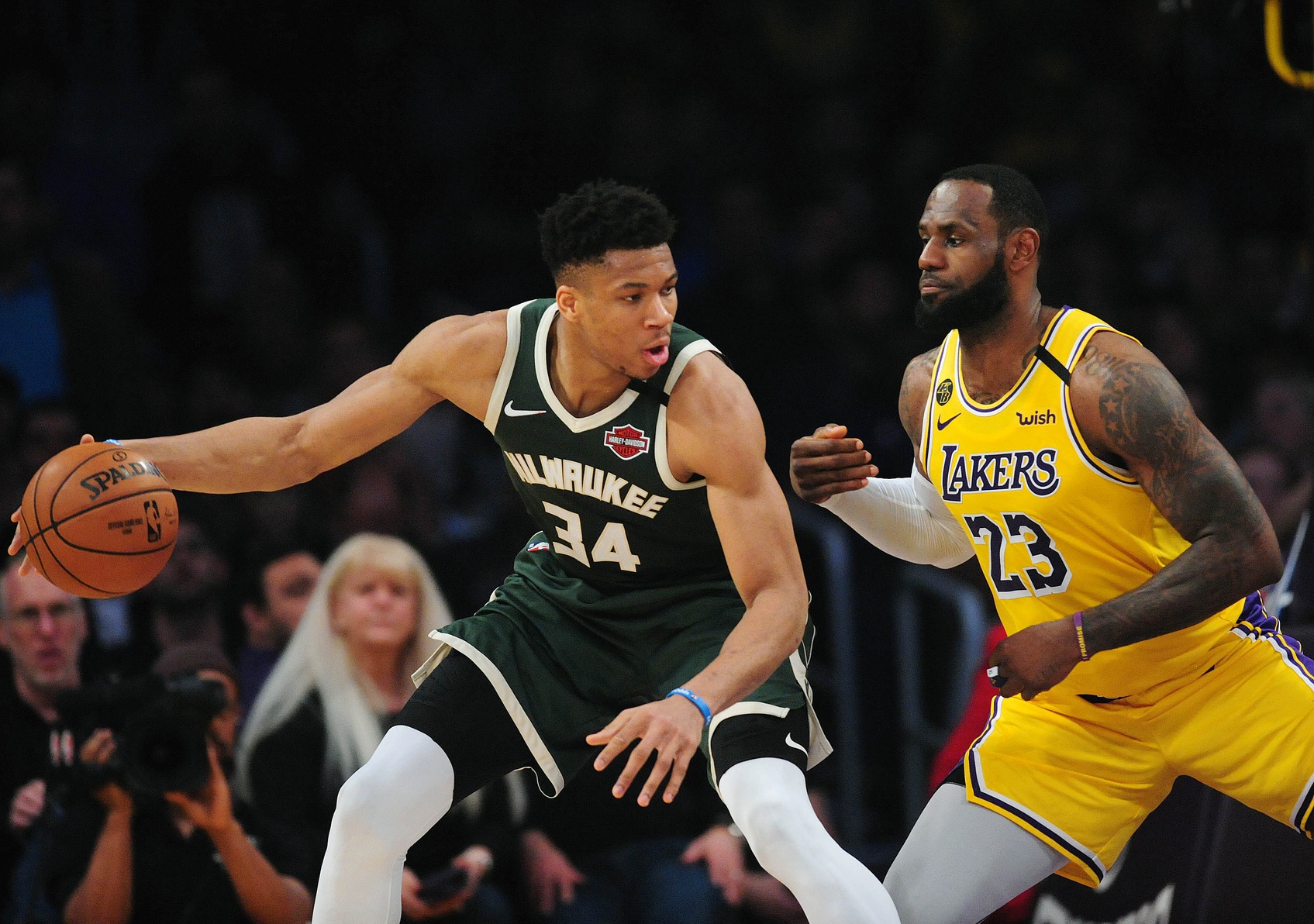 March 6, 2020; Los Angeles, California, USA; Milwaukee Bucks forward Giannis Antetokounmpo (34) controls the ball against Los Angeles Lakers forward LeBron James (23) during the first half at Staples Center. Mandatory Credit: Gary A. Vasquez-USA TODAY Sports