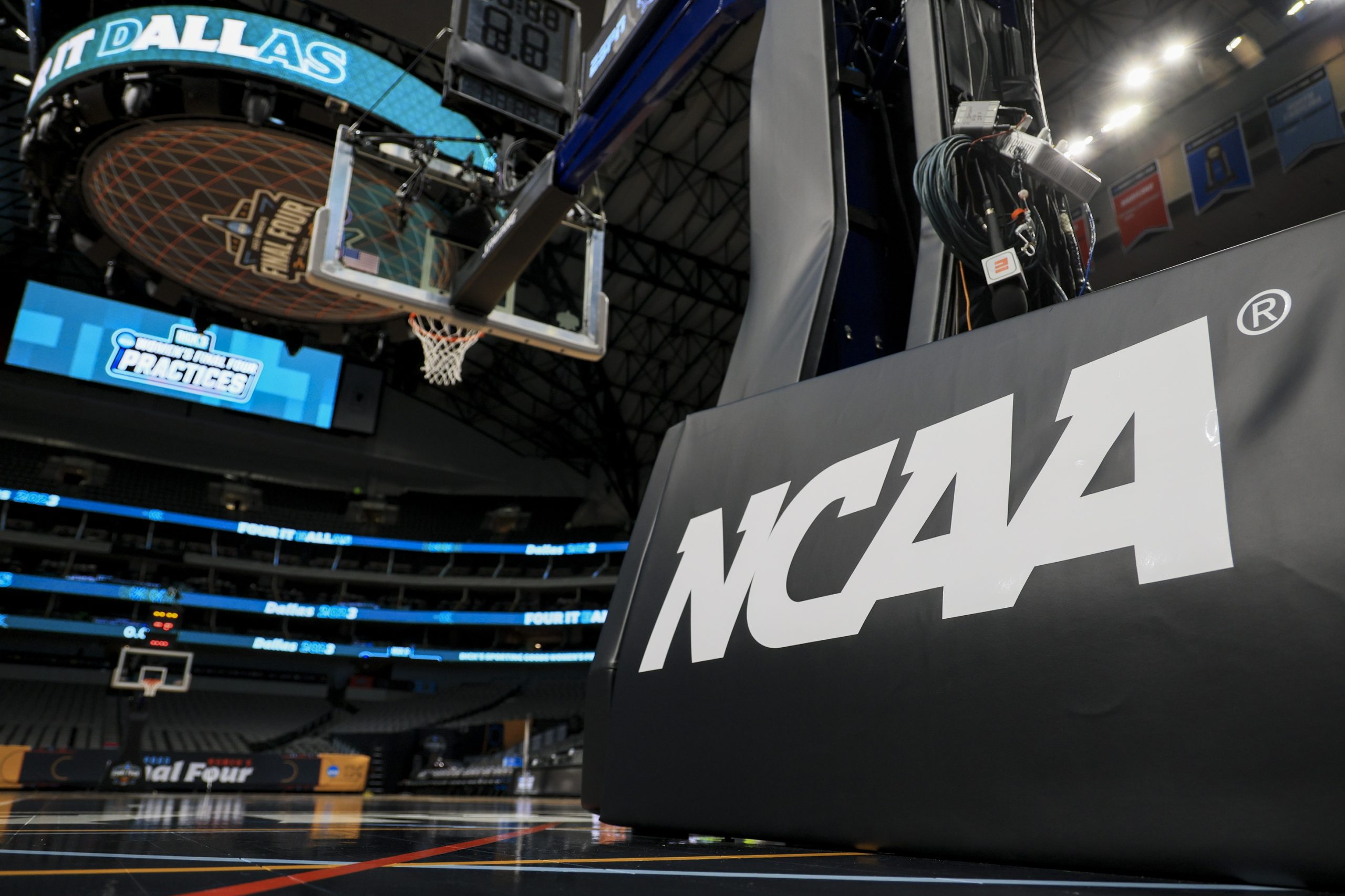 Mar 29, 2023; Dallas, TX, USA; The NCAA logo on the stanchion is seen at the American Airlines Center prior to practice. Mandatory Credit: Aaron Doster-USA TODAY Sports